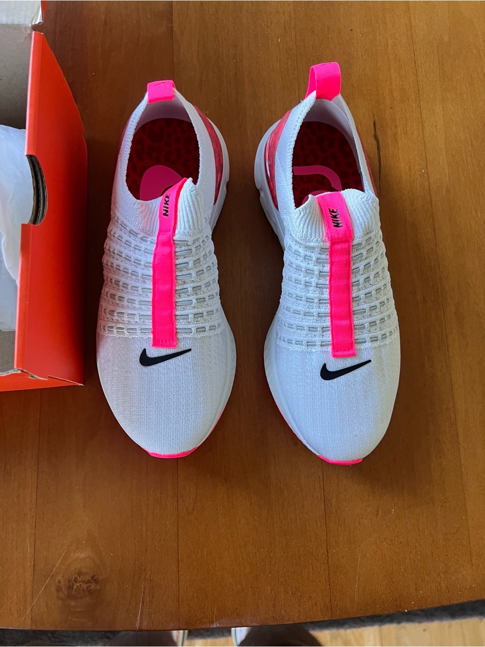 Nike Women’s White Sneakers with Hot Pink Accents